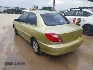 2001 Kia Rio with VIN KNADC123616048085, listed as a IAAI auction lot 42025600 with 123,493 mi miles. Bid and sale history available at carsss.com. Image 3.