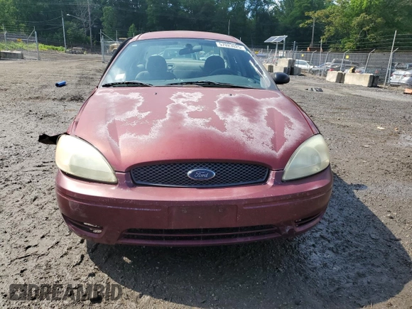2005 Ford Taurus SE z VIN 1FAFP53U35A106807, wystawiony jako Copart lot #57023025 z przebiegiem 168 727 mil mil oraz Szkoda całkowita • Salvage title. Historia ofert i sprzedaży dostępna na DreamBid. Obrazek 5.