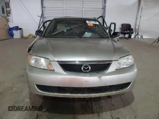 2002 Mazda Protege DX with VIN JM1BJ225021583998, listed as a Copart auction lot 49874135 with Not Provided miles and Non Repairable. Bid and sale history available at DreamBid. Image 5.