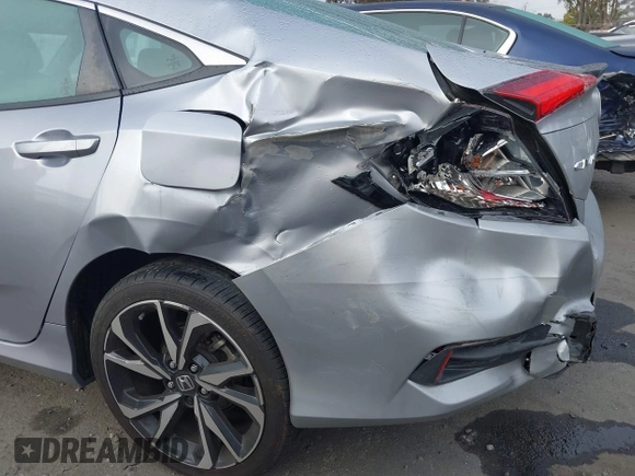 2019 Honda Civic Sedan Sport with VIN 19XFC2F85KE200828, listed as a IAAI auction lot 41807119 with 76,490 mi miles. Bid and sale history available at carsss.com. Image 6.