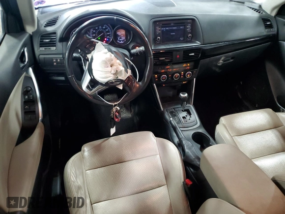 2014 Mazda CX-5 Grand Touring with VIN JM3KE4DY0E0322606, listed as a Copart auction lot 54381815 with 216,022 mi miles and Salvage Title. Bid and sale history available at DreamBid. Image 8.