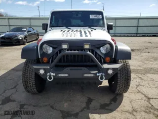 2013 Jeep Wrangler Unlimited Sport with VIN 1C4BJWDG5DL694642, listed as a Copart auction lot 52444395 with 92,559 mi miles and Clean Title. Bid and sale history available at carsss.com. Image 5.