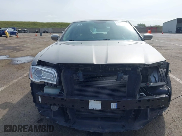 2014 Chrysler 300 with VIN 2C3CCAAG3EH322855, listed as a IAAI auction lot 42053129 with 172,687 mi miles. Bid and sale history available at carsss.com. Image 13.