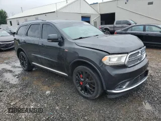 2014 Dodge Durango Citadel с VIN 1C4SDJET3EC361282, выставлен на аукционе Copart как лот 56781505 с пробегом 163 641 миль миль и Списание • Salvage title. История ставок и продаж доступна на DreamBid. Изображение 4.