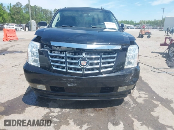 2008 Cadillac Escalade z VIN 1GYEC63818R112129, wystawiony jako IAAI lot #42005558 z przebiegiem 162 875 mil mil oraz . Historia ofert i sprzedaży dostępna na DreamBid. Obrazek 6.