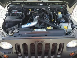 2008 Jeep Wrangler Unlimited X with VIN 1J4GB39108L608465, listed as a Copart auction lot 50949015 with 103,205 mi miles and Salvage Title. Bid and sale history available at DreamBid. Image 11.