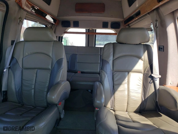 2003 GMC Savana Cargo Van YF7 Upfitter with VIN 1GDFH15T031206554, listed as a Copart auction lot 77584554 with 251,783 mi miles and Salvage Title. Bid and sale history available at carsss.com. Image 10.