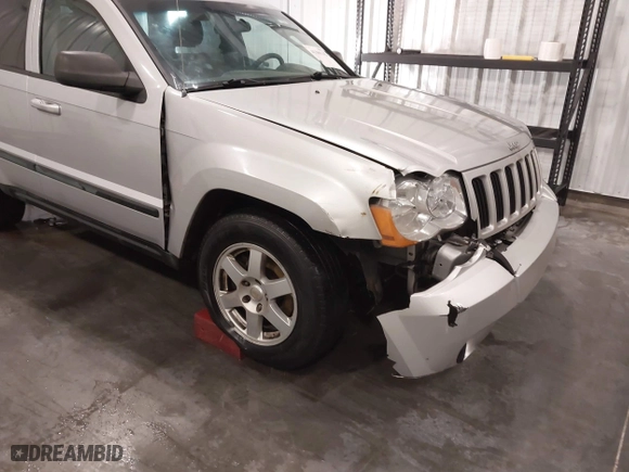 2008 Jeep Grand Cherokee Laredo with VIN 1J8GR48K88C108967, listed as a IAAI auction lot 41306142 with 190,786 mi miles. Bid and sale history available at carsss.com. Image 6.