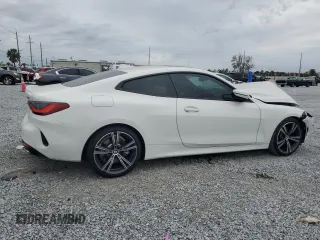 2023 BMW 4 Series 430i with VIN WBA53AP00PCL74865, listed as a Copart auction lot 89057895 with 9,000 mi miles and Salvage title. Bid and sale history available at DreamBid. Image 3.