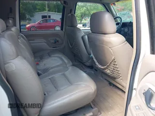 1997 Chevrolet Suburban with VIN 3GNFK16R2VG141730, listed as a IAAI auction lot 42208327 with 158,448 mi miles and . Bid and sale history available at DreamBid. Image 8.