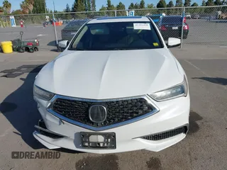 2020 Acura TLX with VIN 19UUB1F3XLA014040, listed as a IAAI auction lot 42385420 with 140,740 mi miles and . Bid and sale history available at DreamBid. Image 12.