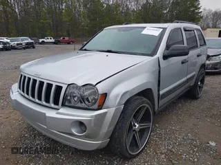 2005 Jeep Grand Cherokee Laredo z VIN 1J4GR48K05C506865, wystawiony jako IAAI lot #41539102 z przebiegiem 237 208 mil mil oraz . Historia ofert i sprzedaży dostępna na DreamBid. Obrazek 2.