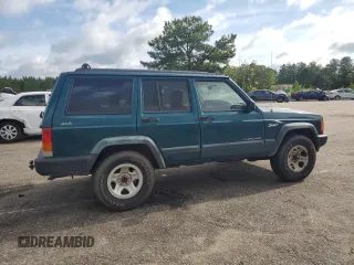 1998 Jeep Cherokee Sport with VIN 1J4FJ68S9WL249365, listed as a Copart auction lot 58896155 with 344,530 mi miles and Clean title. Bid and sale history available at DreamBid. Image 3.