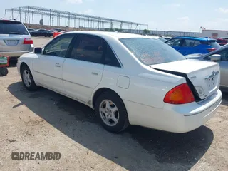 2001 Toyota Avalon XL z VIN 4T1BF28B91U183347, wystawiony jako IAAI lot #42441956 z przebiegiem 310 167 mil mil oraz . Historia ofert i sprzedaży dostępna na DreamBid. Obrazek 3.