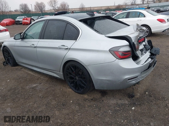 2018 BMW 3 Series 330i xDrive with VIN WBA8D9C55JA607605, listed as a IAAI auction lot 41682994 with 79,285 mi miles and . Bid and sale history available at DreamBid. Image 3.