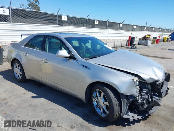 2008 Cadillac CTS RWD with VIN 1G6DM577280111413, listed as a IAAI auction lot 42238643 with 114,706 mi miles and . Bid and sale history available at DreamBid. Image 1.