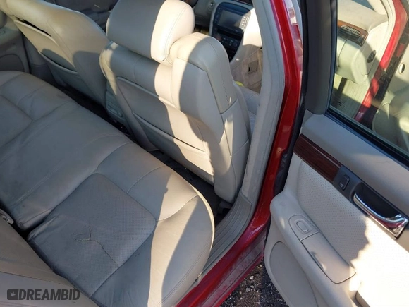 2003 Cadillac Seville Touring STS with VIN 1G6KY54983U212944, listed as a IAAI auction lot 41656796 with 118,662 mi miles. Bid and sale history available at carsss.com. Image 8.