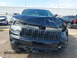 2021 Jeep Grand Cherokee Laredo E with VIN 1C4RJEAG0MC571375, listed as a IAAI auction lot 42087648 with 29,358 mi miles and . Bid and sale history available at DreamBid. Image 13.