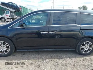 2011 Honda Odyssey EX with VIN 5FNRL5H4XBB011918, listed as a IAAI auction lot 42056043 with 201,821 mi miles and . Bid and sale history available at carsss.com. Image 14.