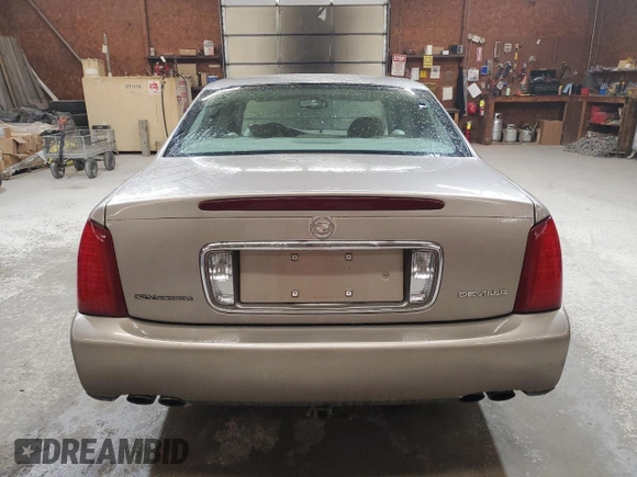2003 Cadillac DeVille with VIN 1G6KD54Y23U194654, listed as a Copart auction lot 53878435 with 77,451 mi miles and Salvage Title. Bid and sale history available at carsss.com. Image 6.