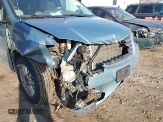 2010 Chrysler Town & Country Limited with VIN 2A4RR6DX9AR153422, listed as a IAAI auction lot 41686509 with 237,868 mi miles. Bid and sale history available at carsss.com. Image 6.