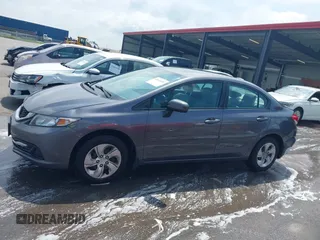 2015 Honda Civic LX with VIN 2HGFB2F59FH561578, listed as a IAAI auction lot 42622451 with 115,387 mi miles and . Bid and sale history available at DreamBid. Image 14.
