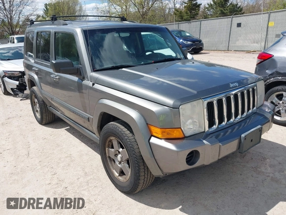 2007 Jeep Commander Sport z VIN 1J8HG48P87C647870, wystawiony jako IAAI lot #42185954 z przebiegiem 269 402 mil mil oraz . Historia ofert i sprzedaży dostępna na DreamBid. Obrazek 1.