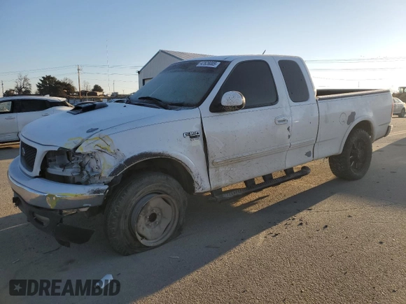 2000 Ford F-150 XL with VIN 1FTRX18L3YKA09007, listed as a Copart auction lot 42828005 with 218,563 mi miles and Salvage Title. Bid and sale history available at carsss.com. Image 1.