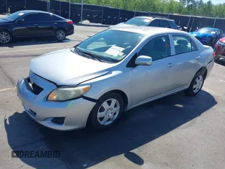 2009 Toyota Corolla with VIN 1NXBU40E99Z100681, listed as a IAAI auction lot 41973116 with 119,744 mi miles. Bid and sale history available at carsss.com. Image 2.