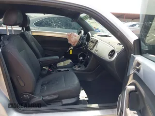 2013 Volkswagen Beetle 2.5L with VIN 3VWJX7AT7DM673319, listed as a IAAI auction lot 42169554 with 128,622 mi miles and . Bid and sale history available at DreamBid. Image 5.