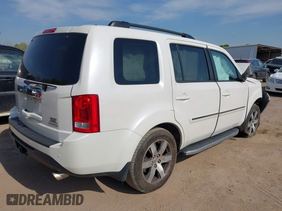 2013 Honda Pilot Touring with VIN 5FNYF3H92DB034731, listed as a IAAI auction lot 42049853 with 127,278 mi miles and . Bid and sale history available at DreamBid. Image 4.