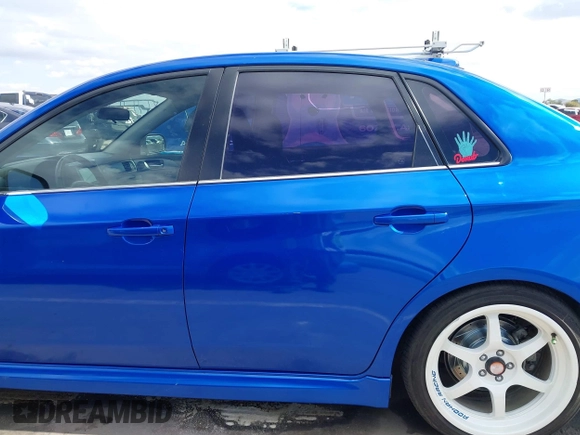 2009 Subaru WRX w/Premium Pkg z VIN JF1GE76619G521520, wystawiony jako IAAI lot #41577390 z przebiegiem 149 257 mil mil oraz . Historia ofert i sprzedaży dostępna na DreamBid. Obrazek 15.