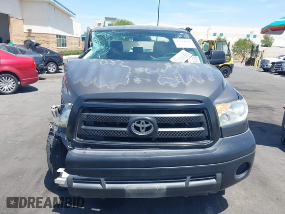 2013 Toyota Tundra z VIN 5TFRM5F15DX053654, wystawiony jako IAAI lot #42324593 z przebiegiem 128 206 mil mil oraz . Historia ofert i sprzedaży dostępna na DreamBid. Obrazek 12.