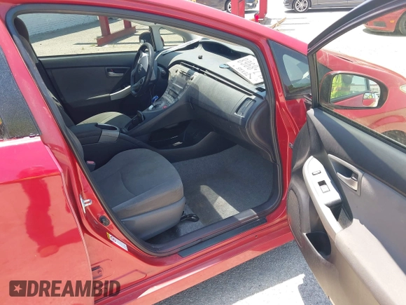 2014 Toyota Prius Four z VIN JTDKN3DU4E0371159, wystawiony jako IAAI lot #42359545 z przebiegiem 171 303 mil mil oraz . Historia ofert i sprzedaży dostępna na DreamBid. Obrazek 5.