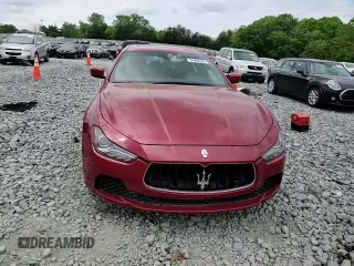 2014 Maserati Ghibli S Q4 with VIN ZAM57RTA7E1128937, listed as a Copart auction lot 54492205 with 79,897 mi miles and Salvage title. Bid and sale history available at DreamBid. Image 13.