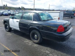 2001 Ford Crown Victoria Police Police Interceptor with VIN 2FAFP71W81X147404, listed as a IAAI auction lot 41932255 with 108,921 mi miles. Bid and sale history available at carsss.com. Image 3.