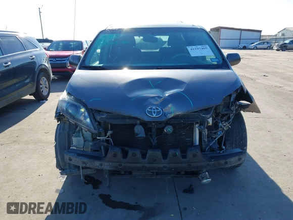 2014 Toyota Sienna SE with VIN 5TDXK3DC7ES482954, listed as a IAAI auction lot 41197465 with 160,107 mi miles and . Bid and sale history available at DreamBid. Image 13.
