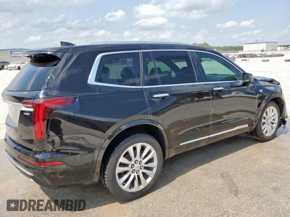 2020 Cadillac XT6 FWD Premium Luxury с VIN 1GYKPCRSXLZ104502, выставлен на аукционе Copart как лот 58211275 с пробегом 97 053 миль миль и Списание • Salvage title. История ставок и продаж доступна на DreamBid. Изображение 3.