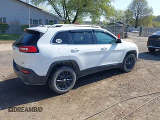 2015 Jeep Cherokee Latitude with VIN 1C4PJMCS0FW790017, listed as a IAAI auction lot 42097988 with 105,990 mi miles and . Bid and sale history available at DreamBid. Image 4.