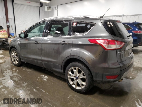 2015 Ford Escape Titanium with VIN 1FMCU9JX0FUA03009, listed as a Copart auction lot 50948755 with 133,748 mi miles and Salvage Title. Bid and sale history available at DreamBid. Image 2.