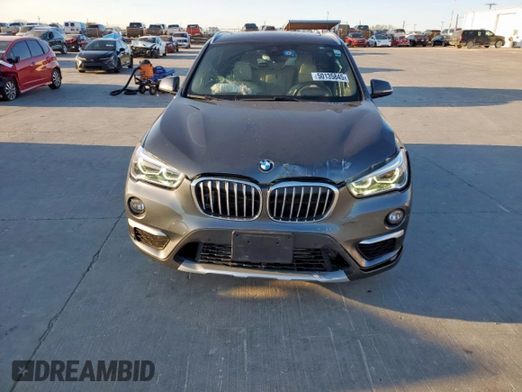 2019 BMW X1 xDrive28i with VIN WBXHT3C51K3H34687, listed as a Copart auction lot 50135845 with 59,549 mi miles and Salvage Title. Bid and sale history available at carsss.com. Image 5.
