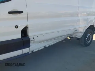 2020 Ford Transit Cargo with VIN 1FTBR1Y83LKA67103, listed as a IAAI auction lot 42408599 with 76,837 mi miles and . Bid and sale history available at DreamBid. Image 6.