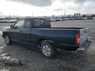 1999 Nissan Frontier XE with VIN 1N6DD26S6XC332458, listed as a Copart auction lot 48028715 with 182,706 mi miles and Salvage title. Bid and sale history available at DreamBid. Image 2.