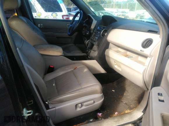 2012 Honda Pilot Touring with VIN 5FNYF3H90CB035309, listed as a IAAI auction lot 41063215 with 228,081 mi miles and . Bid and sale history available at carsss.com. Image 5.
