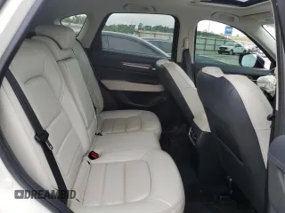 2019 Mazda CX-5 Grand Touring with VIN JM3KFADM6K1581261, listed as a Copart auction lot 59965175 with 127,837 mi miles and Salvage title. Bid and sale history available at DreamBid. Image 10.