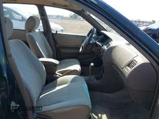 1997 Toyota Corolla with VIN 1NXBA02E7VZ601593, listed as a IAAI auction lot 42771723 with 247,823 mi miles and . Bid and sale history available at DreamBid. Image 5.