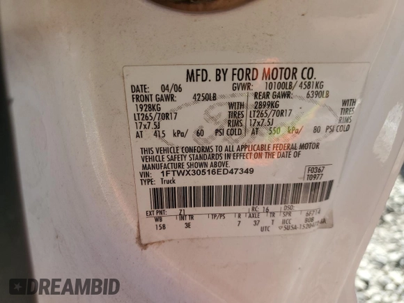 2006 Ford F-350 with VIN 1FTWX30516ED47349, listed as a Copart auction lot 69892384 with 130,444 mi miles and Salvage title. Bid and sale history available at DreamBid. Image 12.