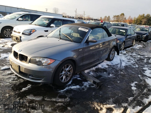 2009 BMW 1 Series 128i with VIN WBAUN13569VH80991, listed as a Copart auction lot 43225685 with 104,652 mi miles and Salvage Title. Bid and sale history available at DreamBid. Image 1.