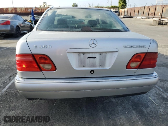 1998 Mercedes-Benz E 320 with VIN WDBJF25F3WA689755, listed as a Copart auction lot 51288455 with 124,157 mi miles and Salvage Title. Bid and sale history available at DreamBid. Image 6.