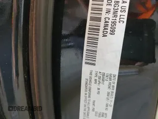 2022 Chrysler Pacifica Touring L with VIN 2C4RC1BG3NR195099, listed as a Copart auction lot 54214885 with 69,039 mi miles and Salvage title. Bid and sale history available at DreamBid. Image 13.